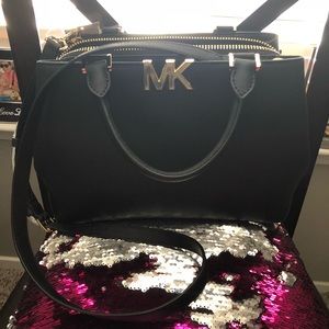 Mk purse/crossbody both can be used size is medium